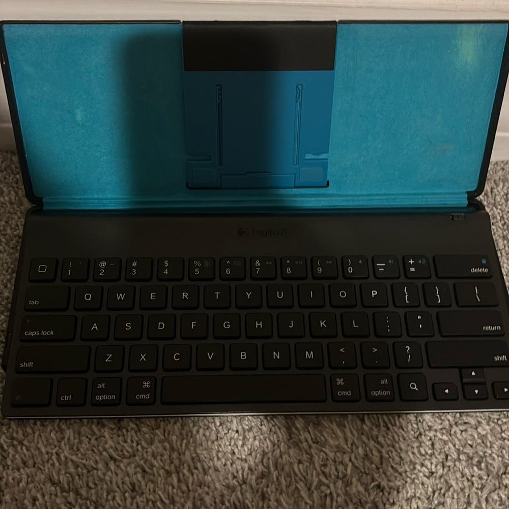 Logitech keyboard with case.